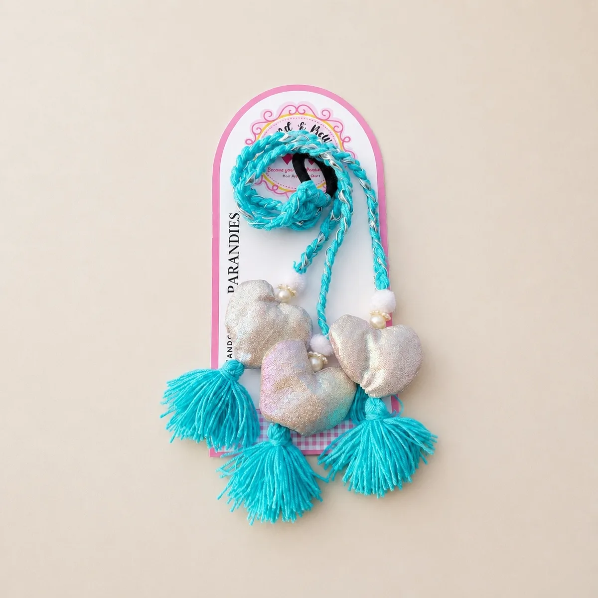 TURQUOISE HEART TASSEL PARANDI